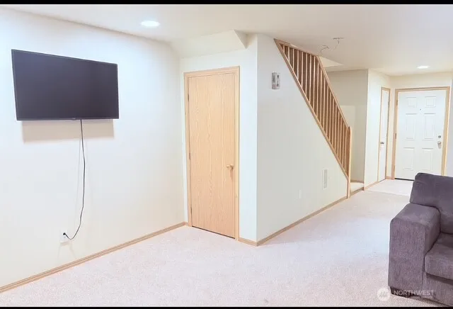 a view of livingroom with furniture and wooden floor