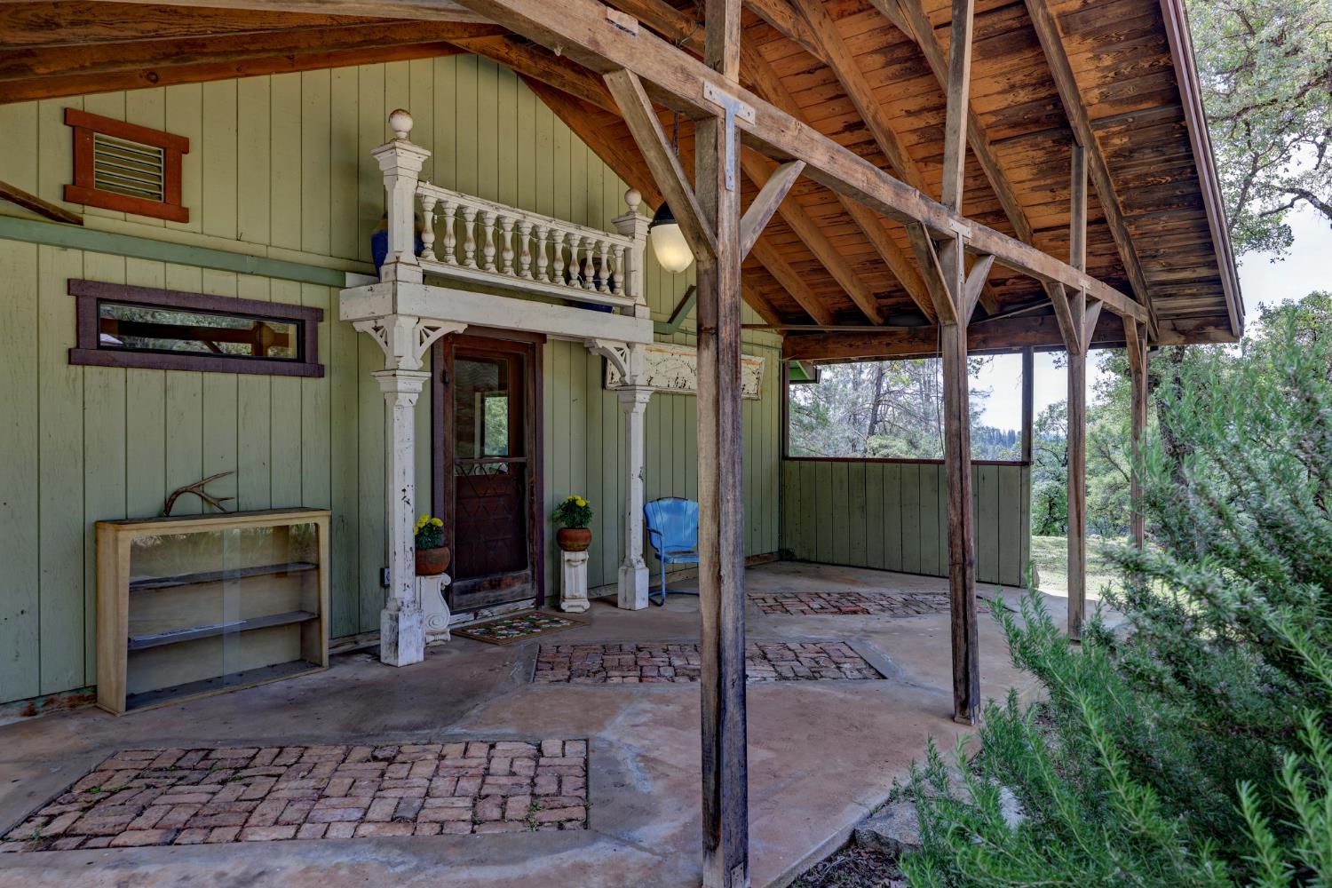 1480 Sage Road Colfax, CA 95713 - Photo 4 of 52 Redwood Portico from 1990 Mendocino Store Front outlines the front door.