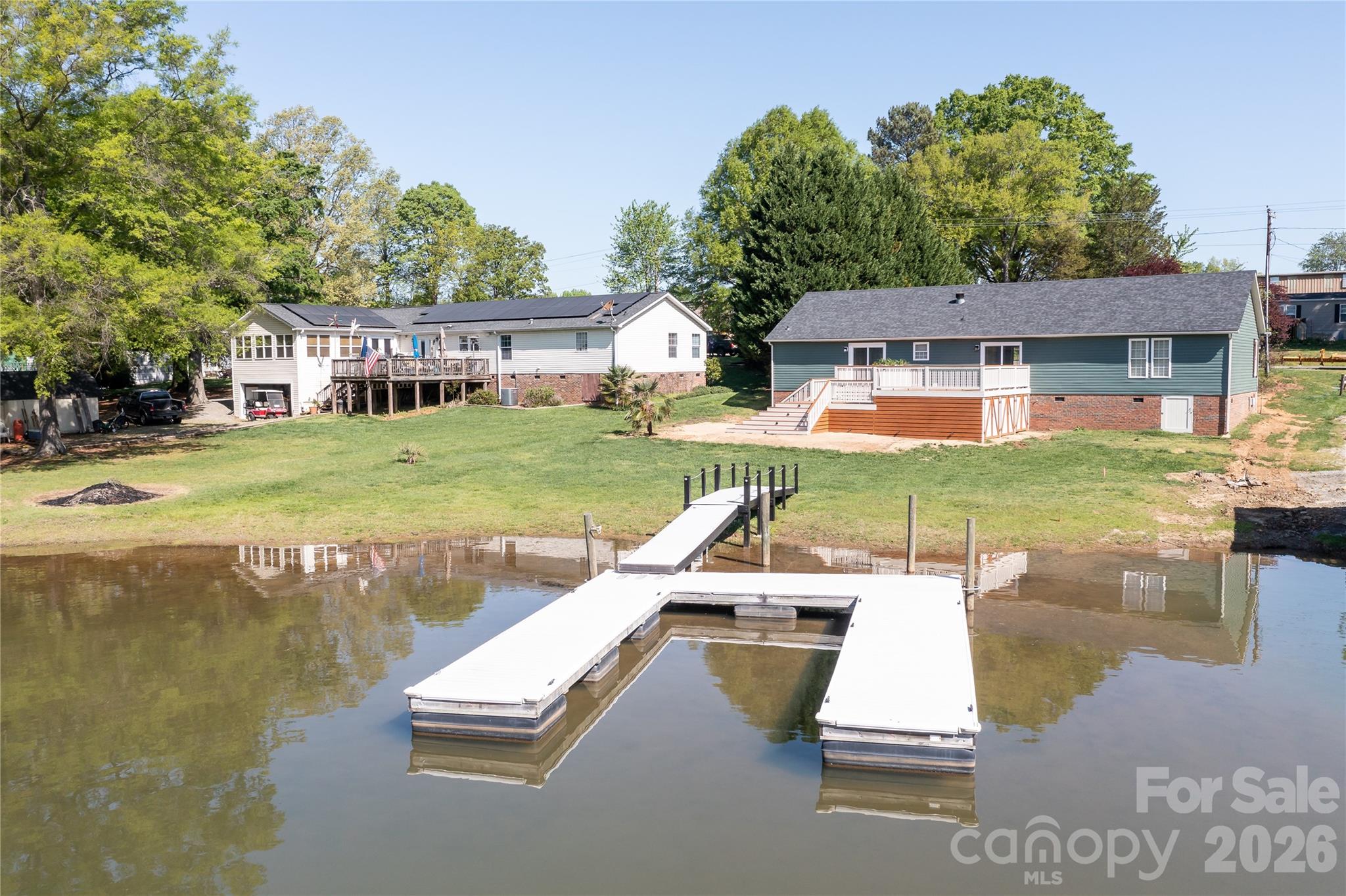 7858 Blackwood Road Denver, NC 28037 - Photo 4 of 11 a view of a house with pool and a yard