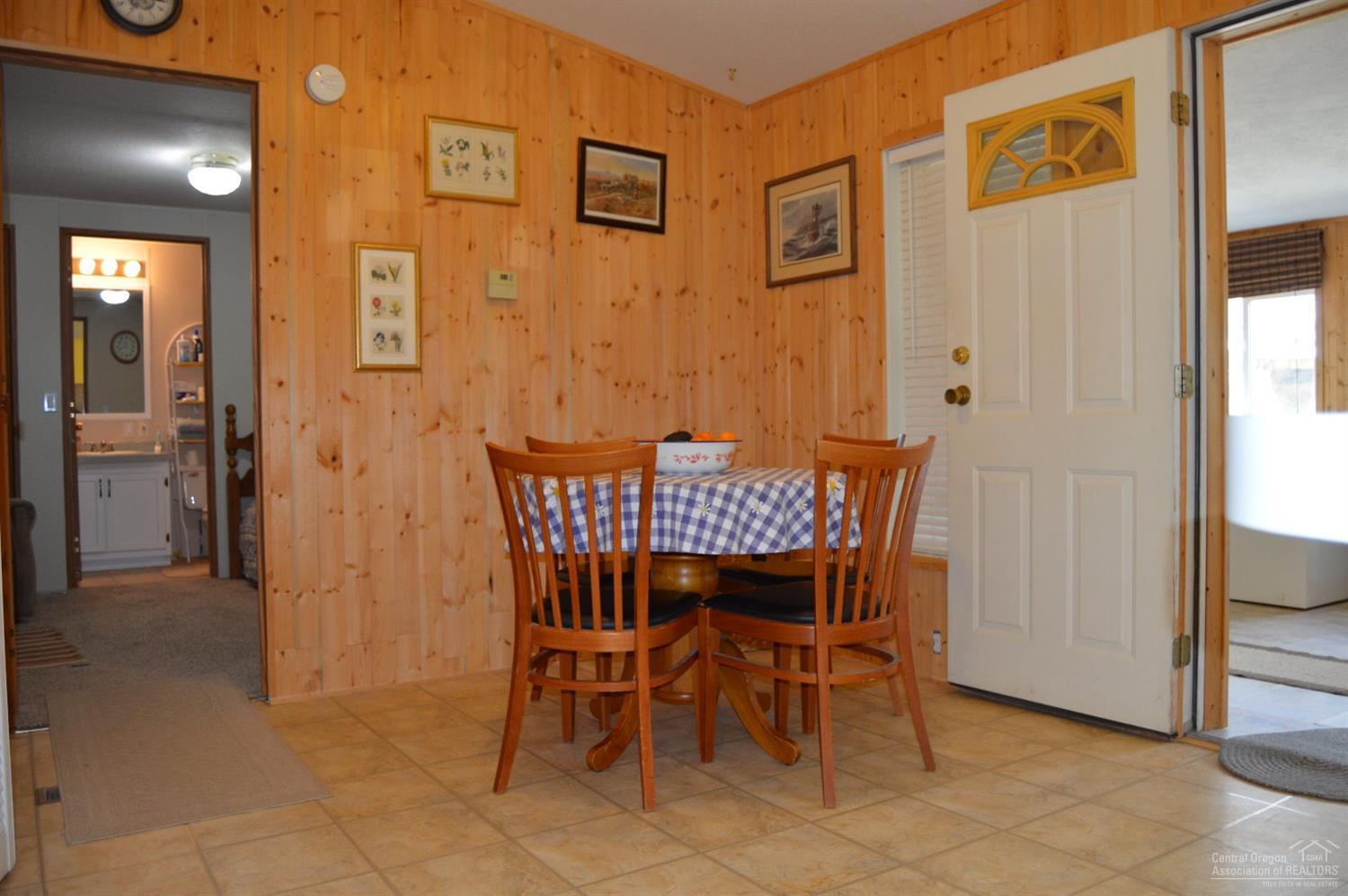 8280 Southwest Crater Loop Road Terrebonne, OR 97760 - Photo 2 of 25 Beautiful Knotty Pine accent wall in the