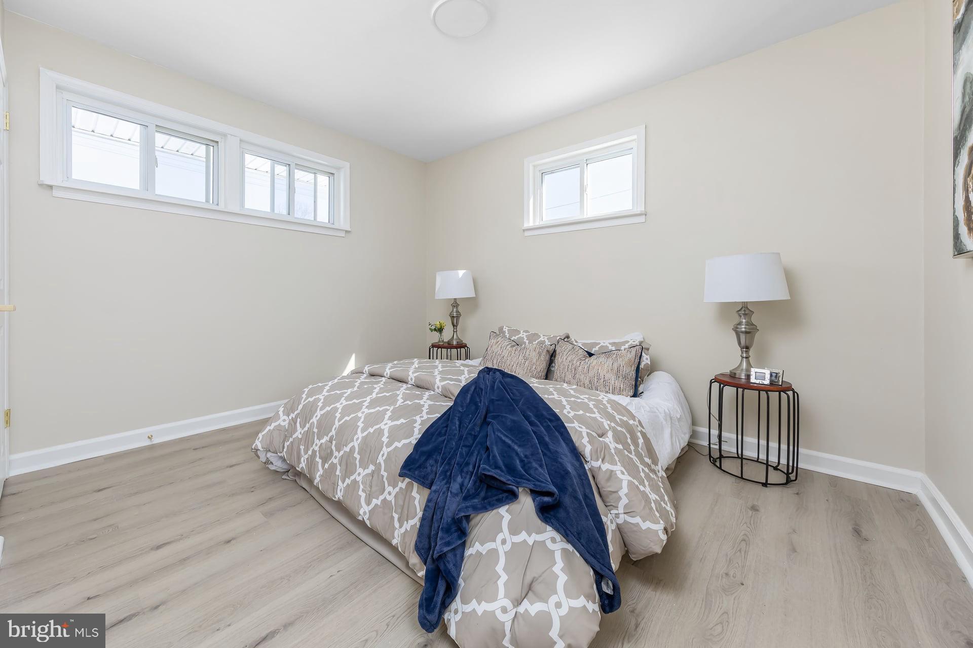 1117 Monmouth Road Deptford, NJ 08096 - Photo 12 of 18 a bedroom with bed and a window