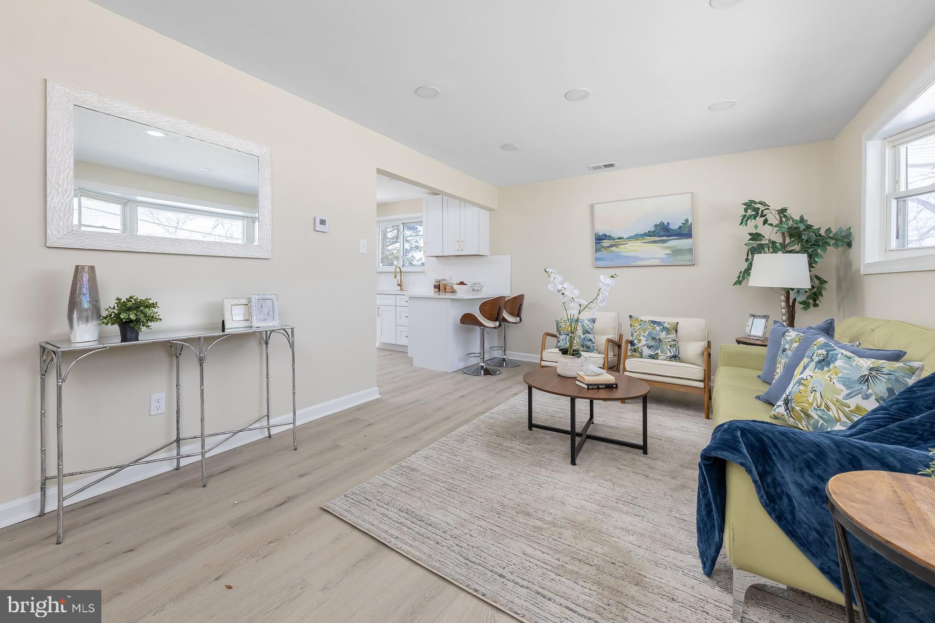 1117 Monmouth Road Deptford, NJ 08096 - Photo 4 of 18 a living room with furniture and a window