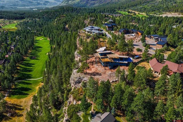 a view of a lake with a house