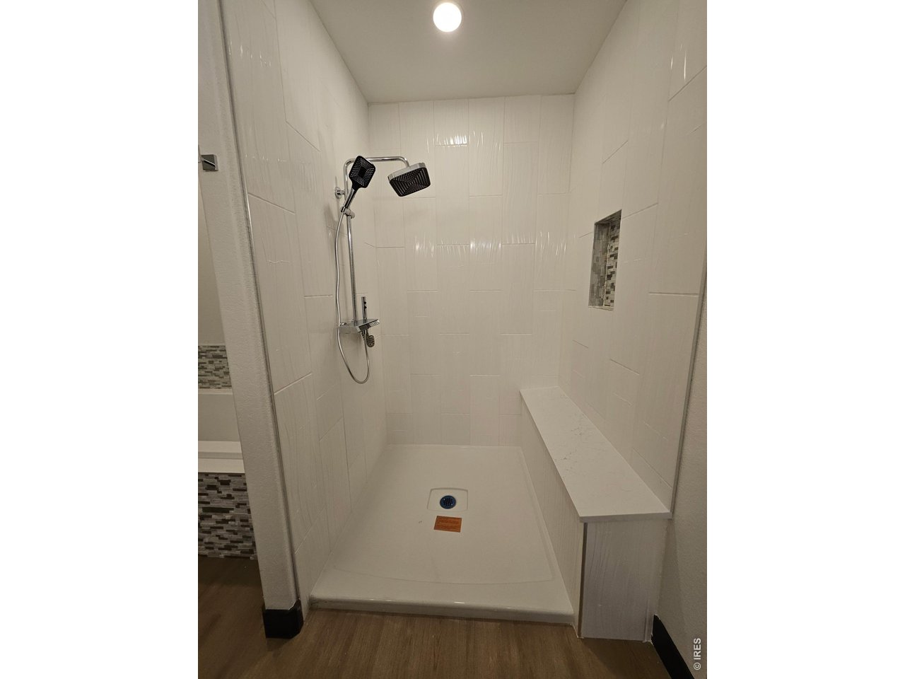 16505 Fairbanks Road North Platteville, CO 80651 - Photo 5 of 13 a bathroom with a white bath tub