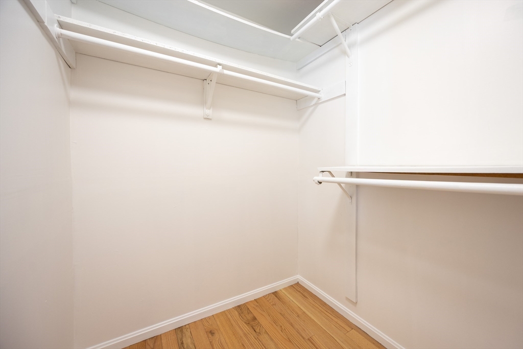 75 Sandy Pond Road, Unit 24 Ayer, MA 01432 - Photo 17 of 41 a view of a room with wooden floor