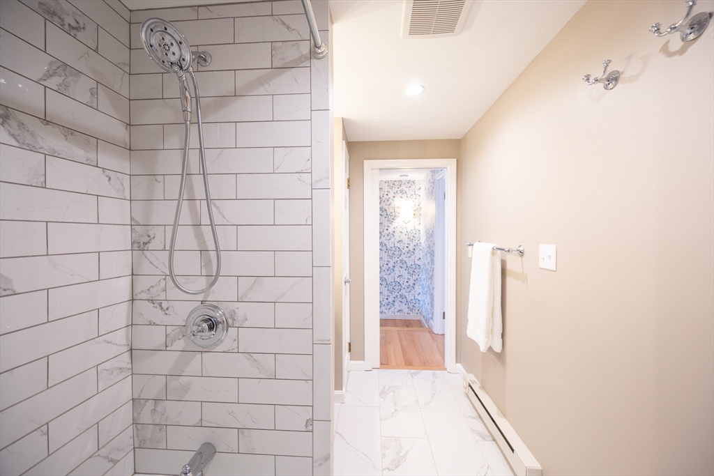 75 Sandy Pond Road, Unit 24 Ayer, MA 01432 - Photo 23 of 41 a bathroom with a shower