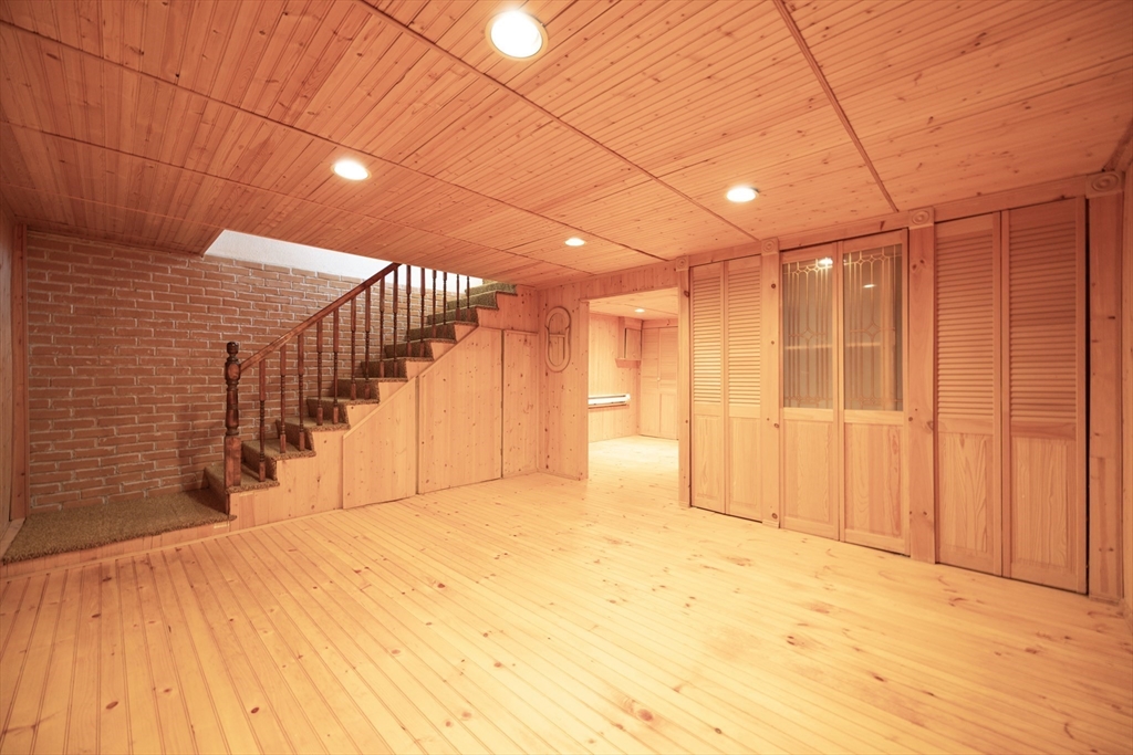75 Sandy Pond Road, Unit 24 Ayer, MA 01432 - Photo 27 of 41 a view of a hallway with wooden floor