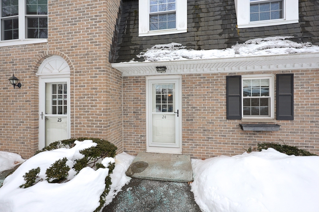 75 Sandy Pond Road, Unit 24 Ayer, MA 01432 - Photo 32 of 41 a view of a house with a yard