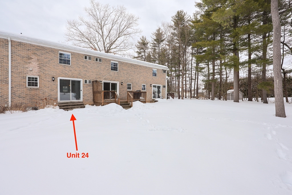 75 Sandy Pond Road, Unit 24 Ayer, MA 01432 - Photo 37 of 41 a view of outdoor space yard and deck