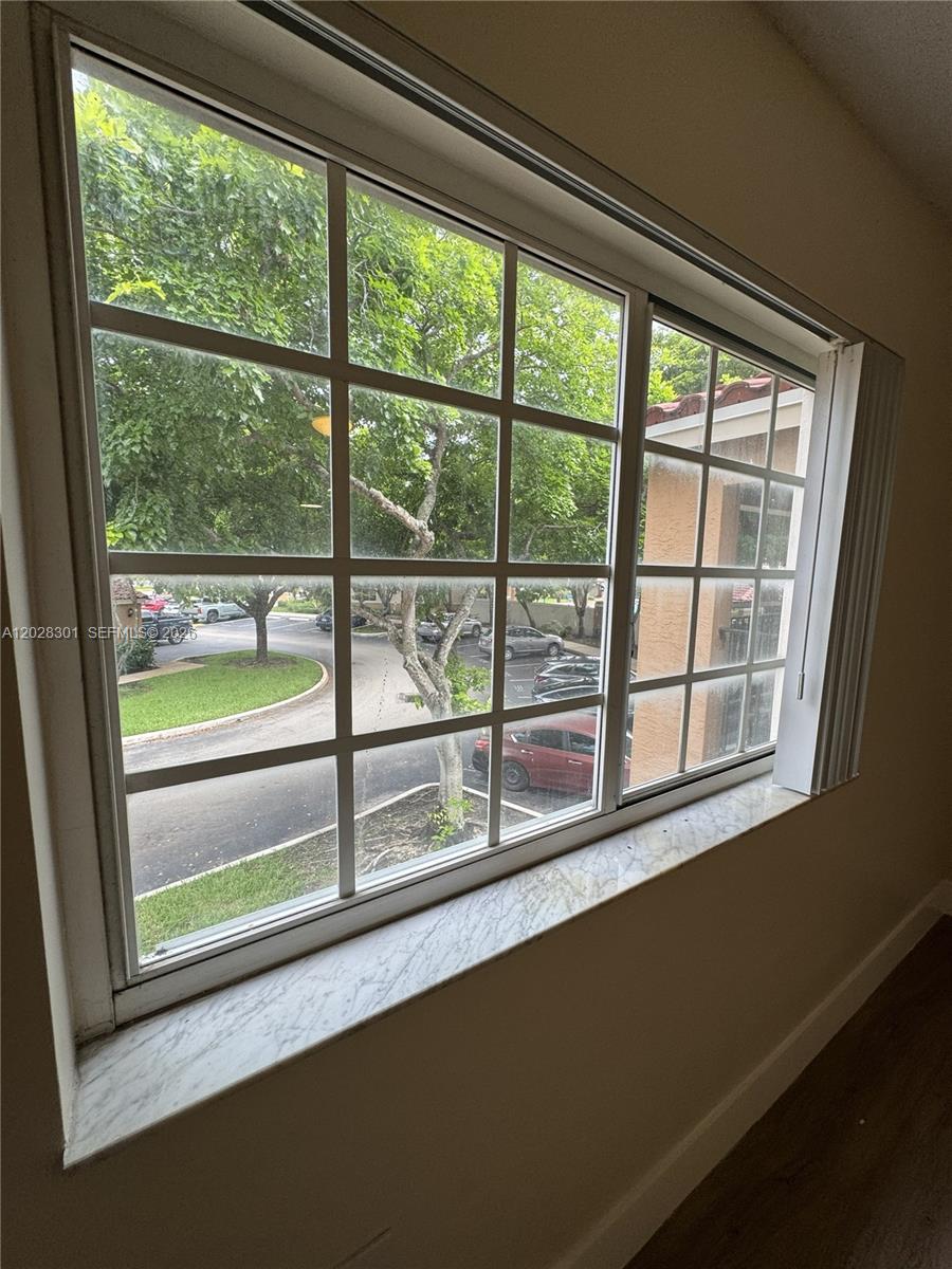 2021 Renaissance Boulevard, Unit 201 Miramar, FL 33025 - Photo 16 of 26 a view of a room that has a window and outside view
