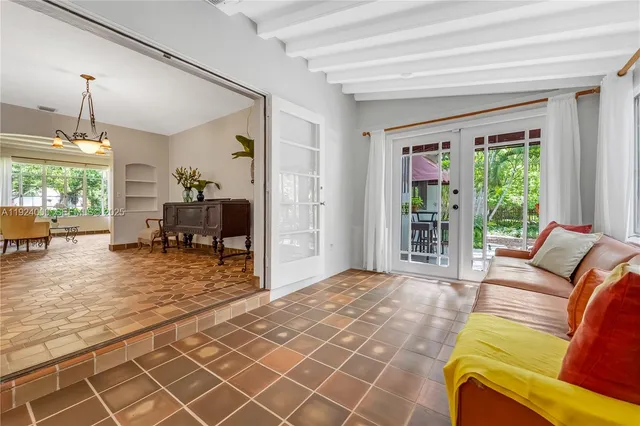 a living room with a couch and a table
