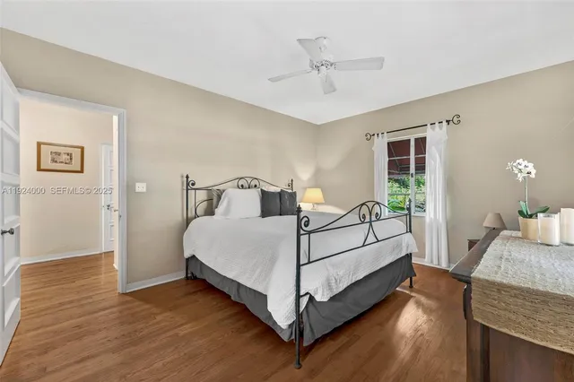 a bathroom with a sink toilet and mirror