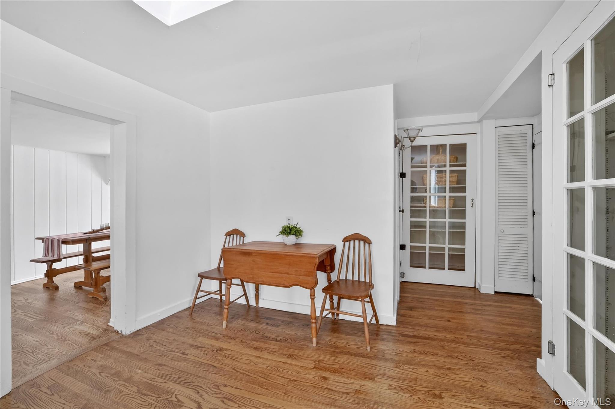 1835 Jacob Road Cortlandt Manor, NY 10567 - Photo 11 of 27 a view of a livingroom with furniture and wooden floor