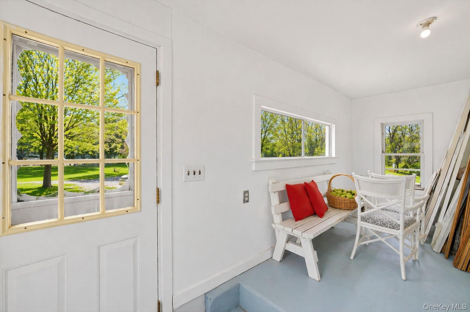 1835 Jacob Road Cortlandt Manor, NY 10567 - Photo 13 of 27 a chair and a table in a room