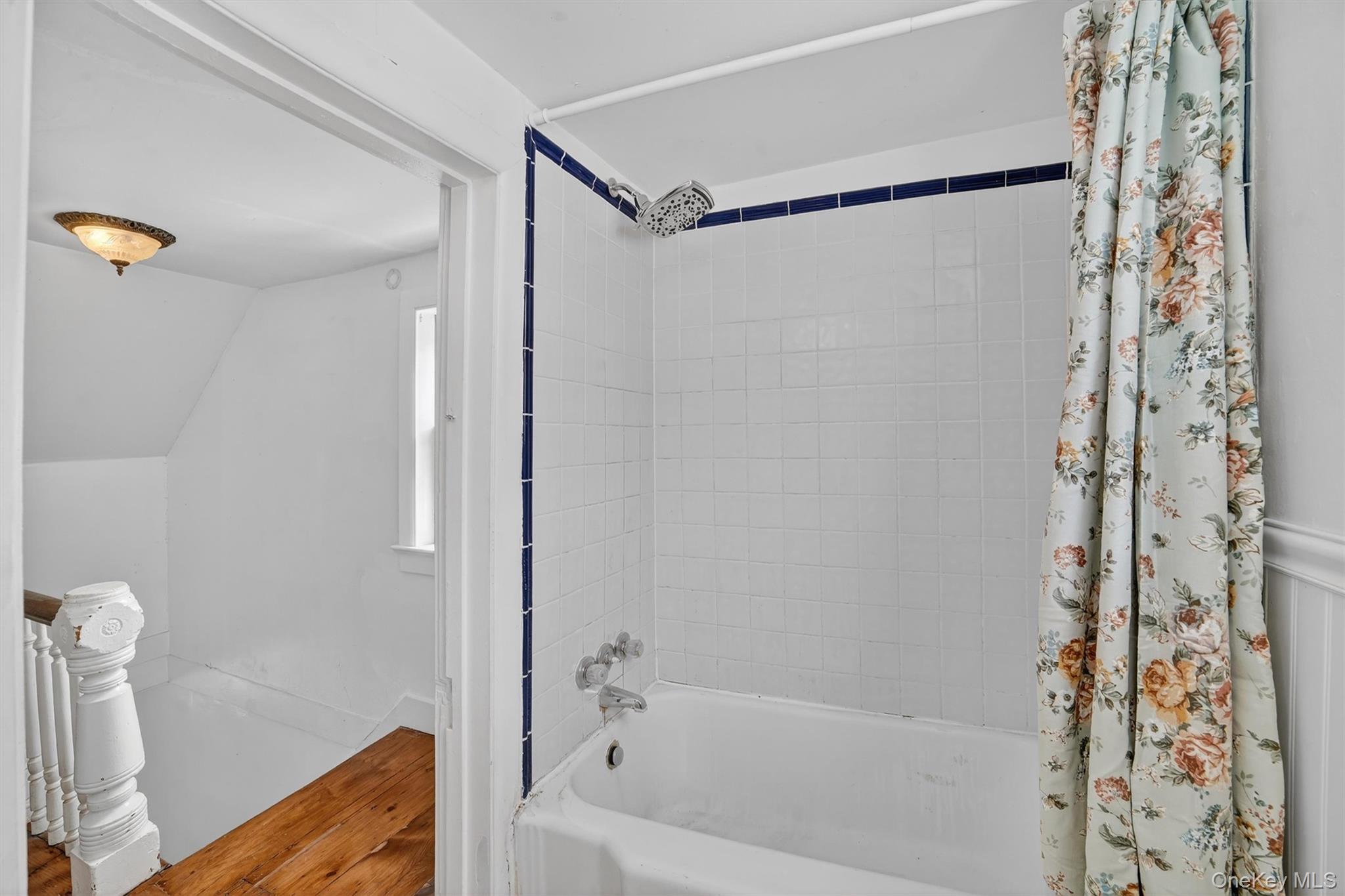 1835 Jacob Road Cortlandt Manor, NY 10567 - Photo 16 of 27 a bathroom with a bathtub and shower