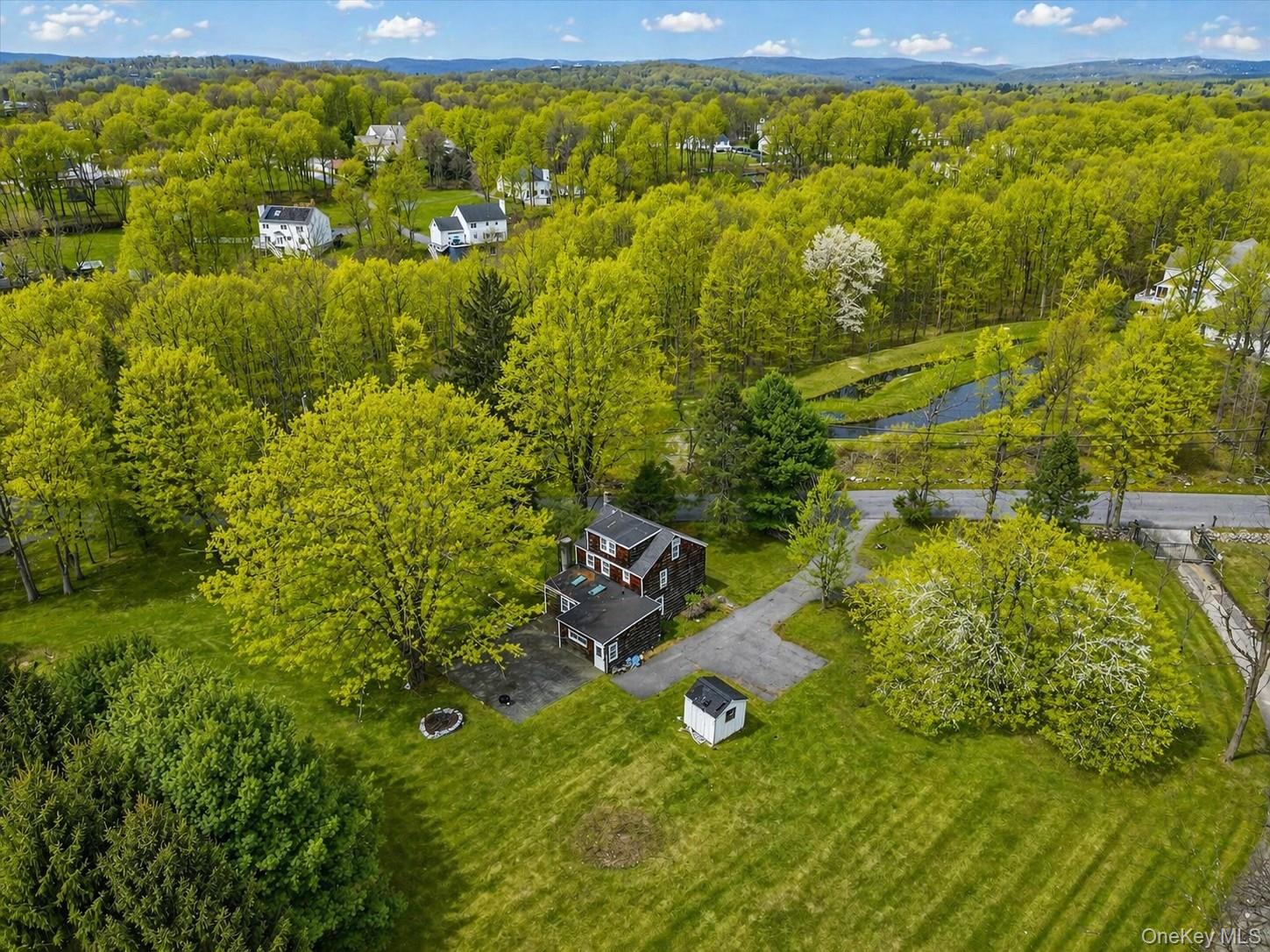1835 Jacob Road Cortlandt Manor, NY 10567 - Photo 26 of 27 a view of a yard with an outdoor space