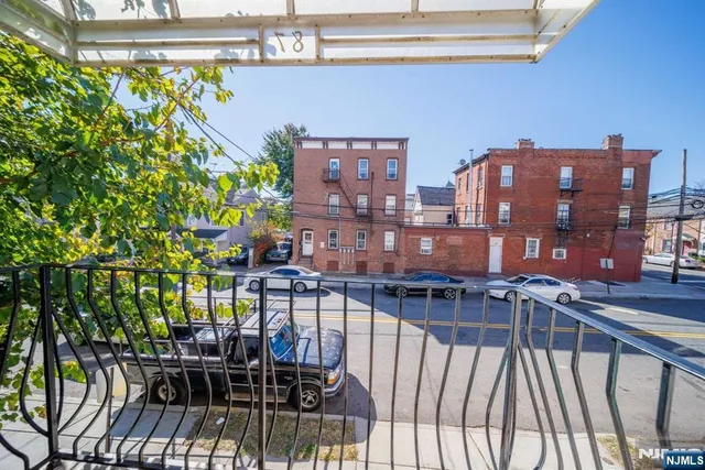 a view of balcony with furniture and outdoor seating
