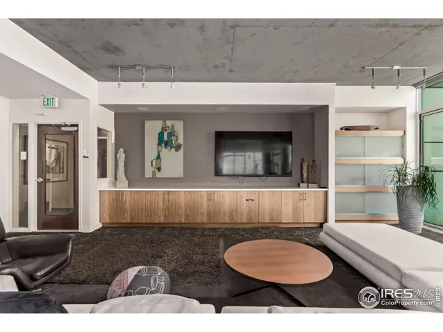 a living room with furniture and window