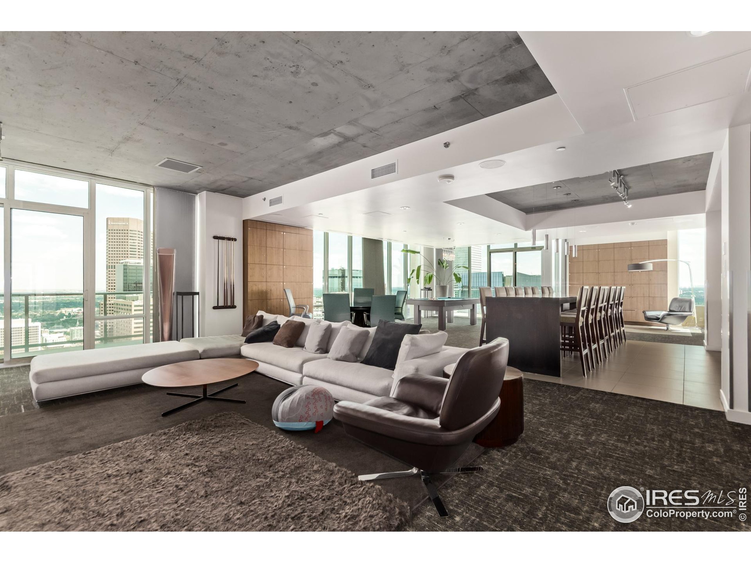 891 14th Street, Unit 3904 Denver, CO 80202 - Photo 17 of 39 a living room with furniture and a large window