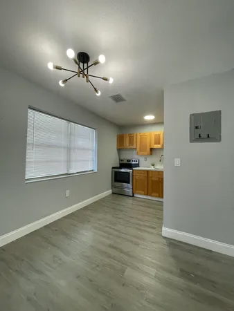 a view of a kitchen with a sink cabinets and a kitchen