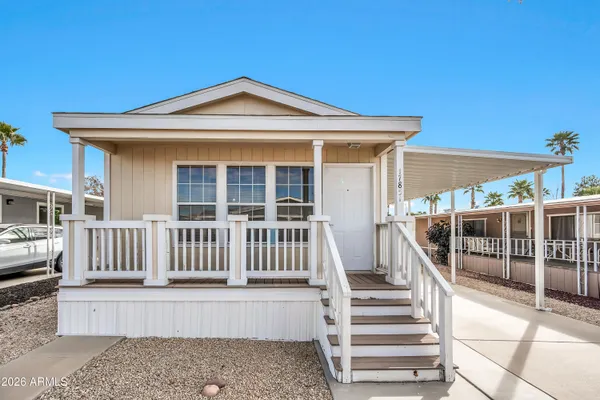 a front view of a house with a porch