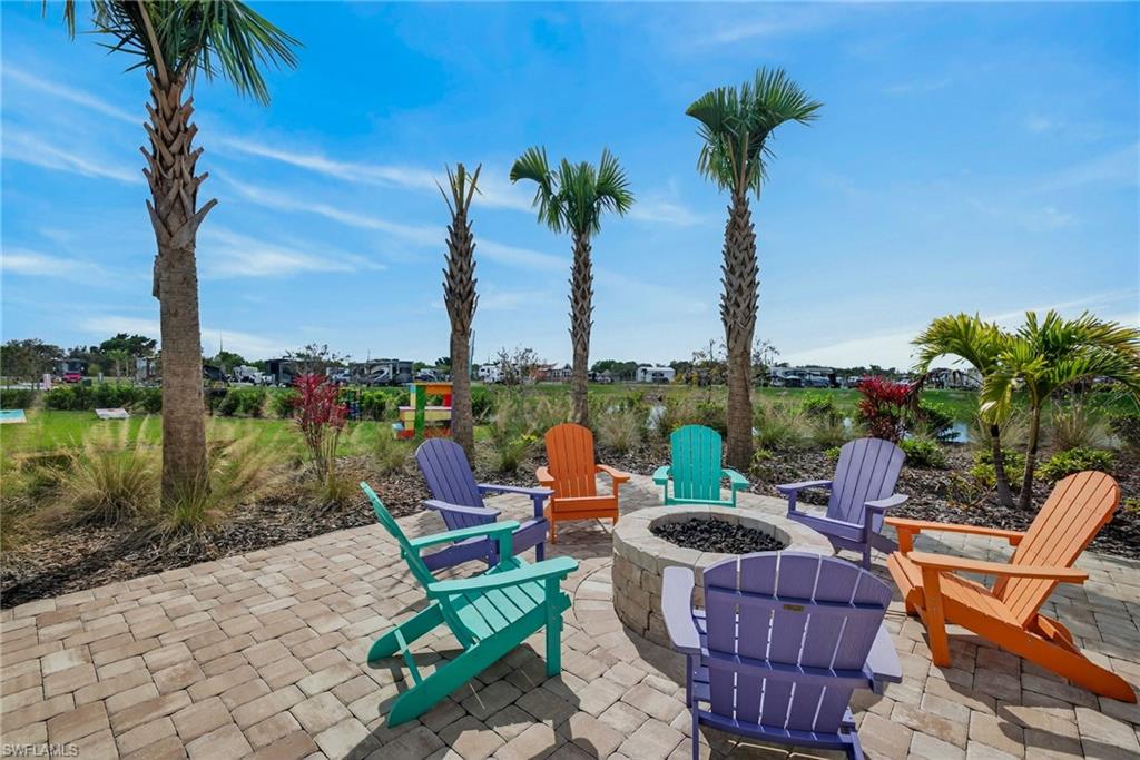 327 Sovereign Street Punta Gorda, FL 33982 - Photo 16 of 25 a patio with table and chairs