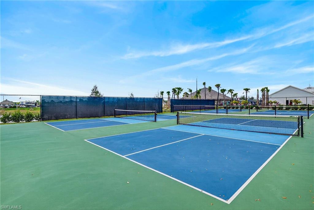 327 Sovereign Street Punta Gorda, FL 33982 - Photo 19 of 25 a view of an outdoor space and tennis court