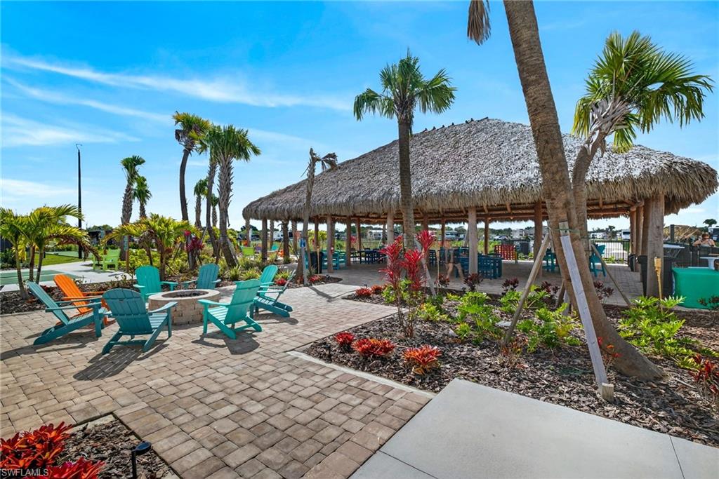 327 Sovereign Street Punta Gorda, FL 33982 - Photo 22 of 25 a view of a chairs and tables in patio