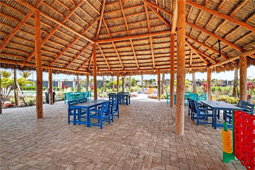 327 Sovereign Street Punta Gorda, FL 33982 - Photo 23 of 25 a view of a swimming pool with outdoor seating