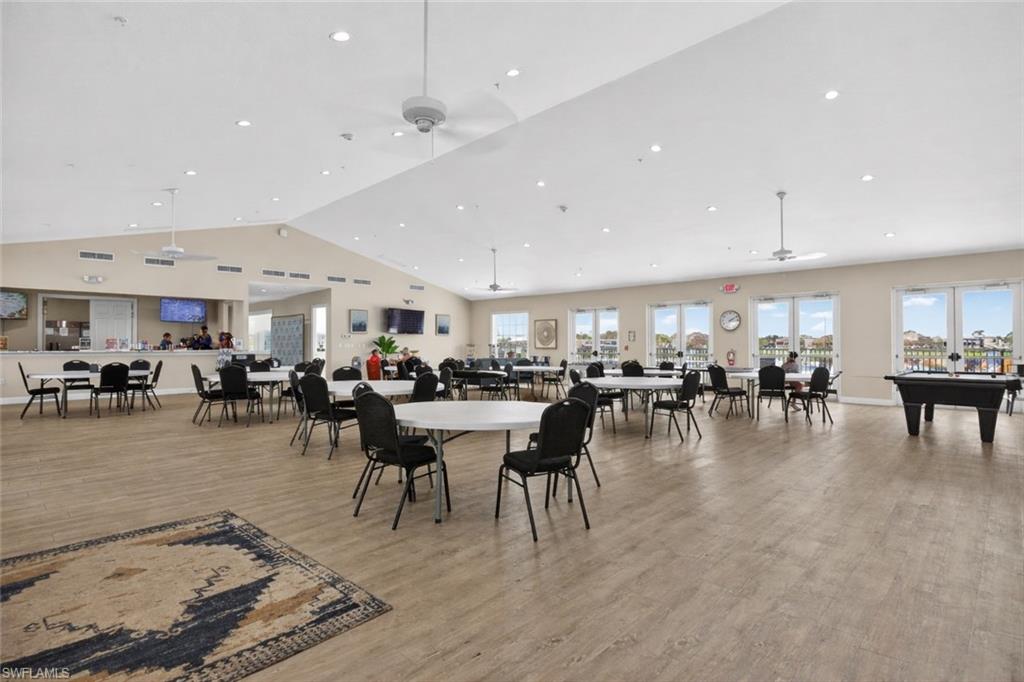 327 Sovereign Street Punta Gorda, FL 33982 - Photo 24 of 25 a living room with lots of furniture and a view of dining table