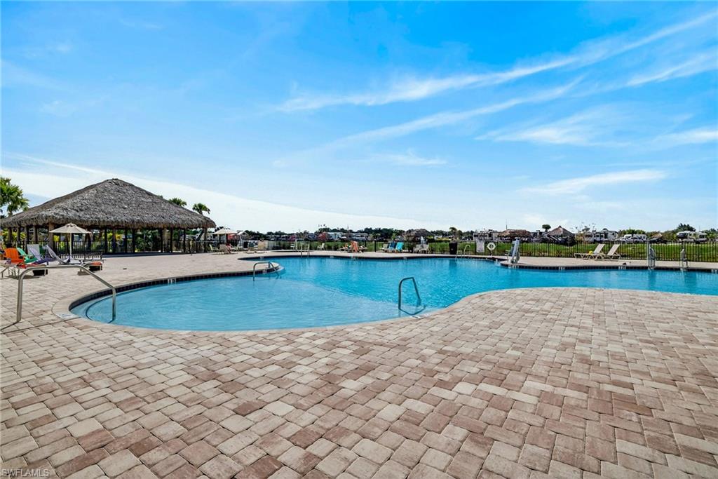 327 Sovereign Street Punta Gorda, FL 33982 - Photo 25 of 25 a view of a swimming pool and lake
