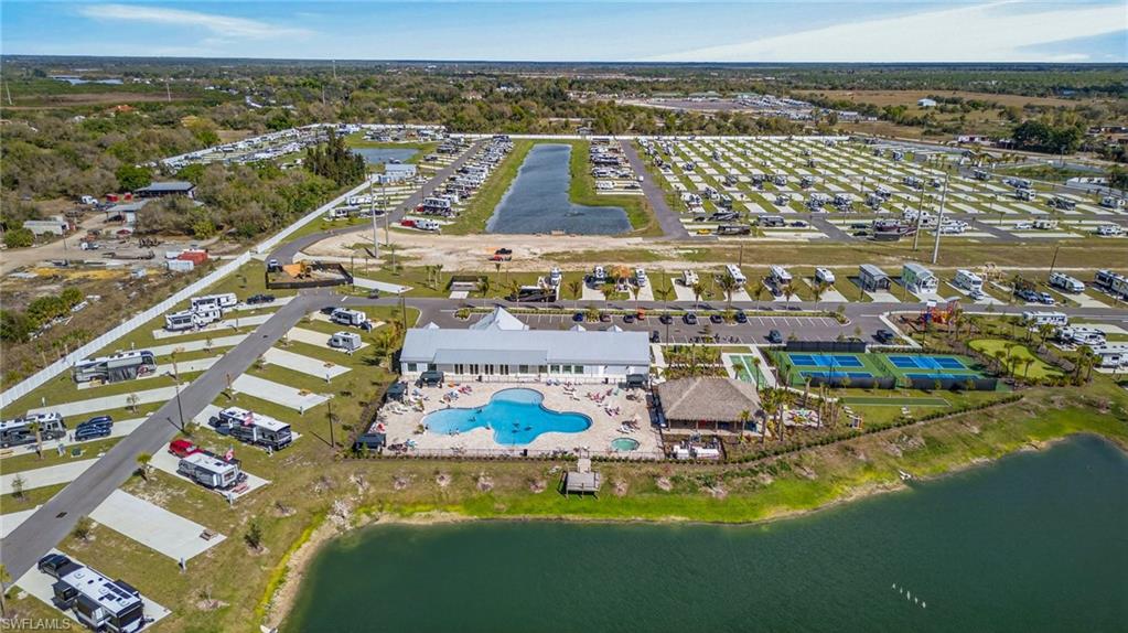 327 Sovereign Street Punta Gorda, FL 33982 - Photo 5 of 25 a view of a swimming pool with a lake