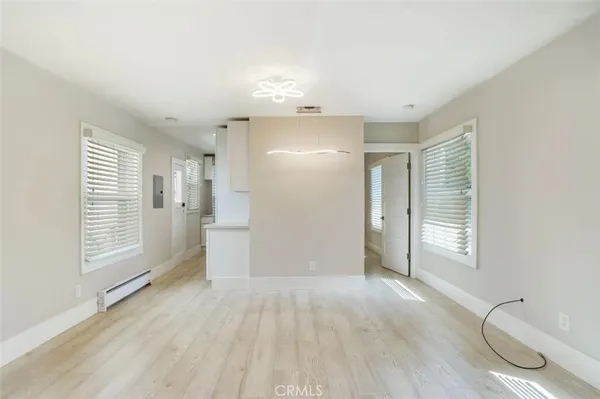 a view of an empty room with a window