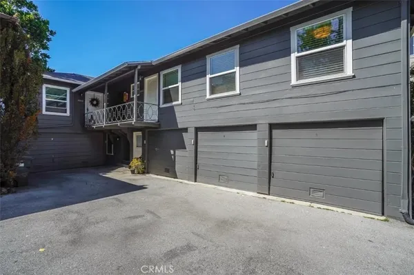 a view of a house with a garage