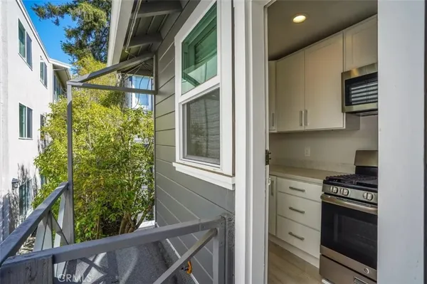 a kitchen with stainless steel appliances a stove and a refrigerator