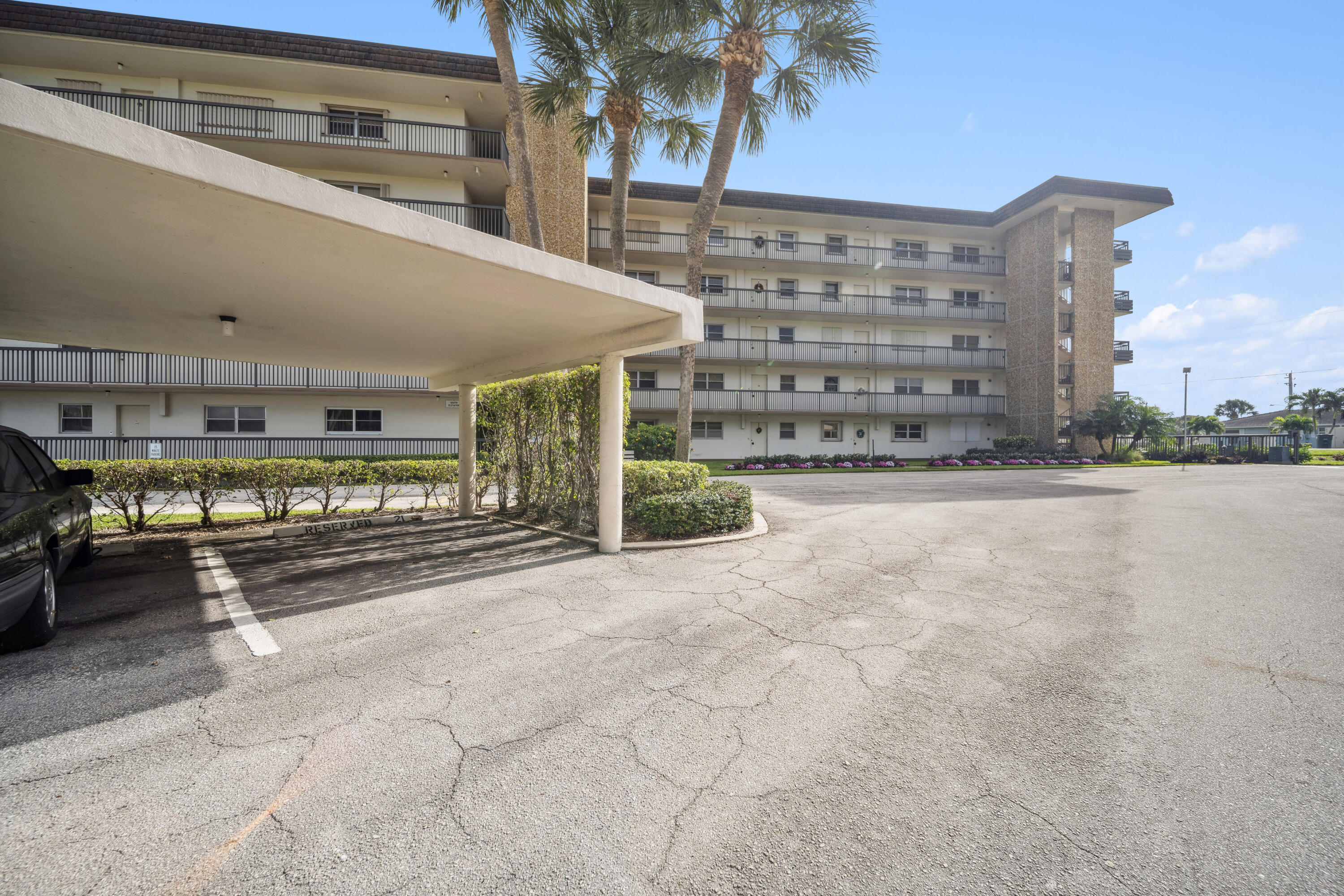 555 Northwest 4th Avenue, Unit 1240 Boca Raton, FL 33432 - Photo 28 of 31 Corner-Covered Parking near front door