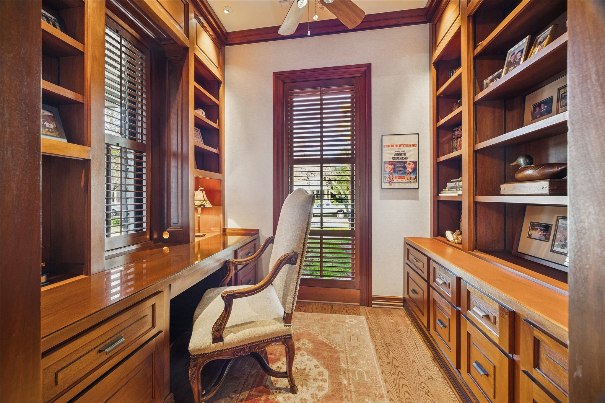 3715 Garnet Street Houston, TX 77005 - Photo 11 of 50 One of two studies in the home, this one, off the formal living room, has ample shelving and filing storage.
