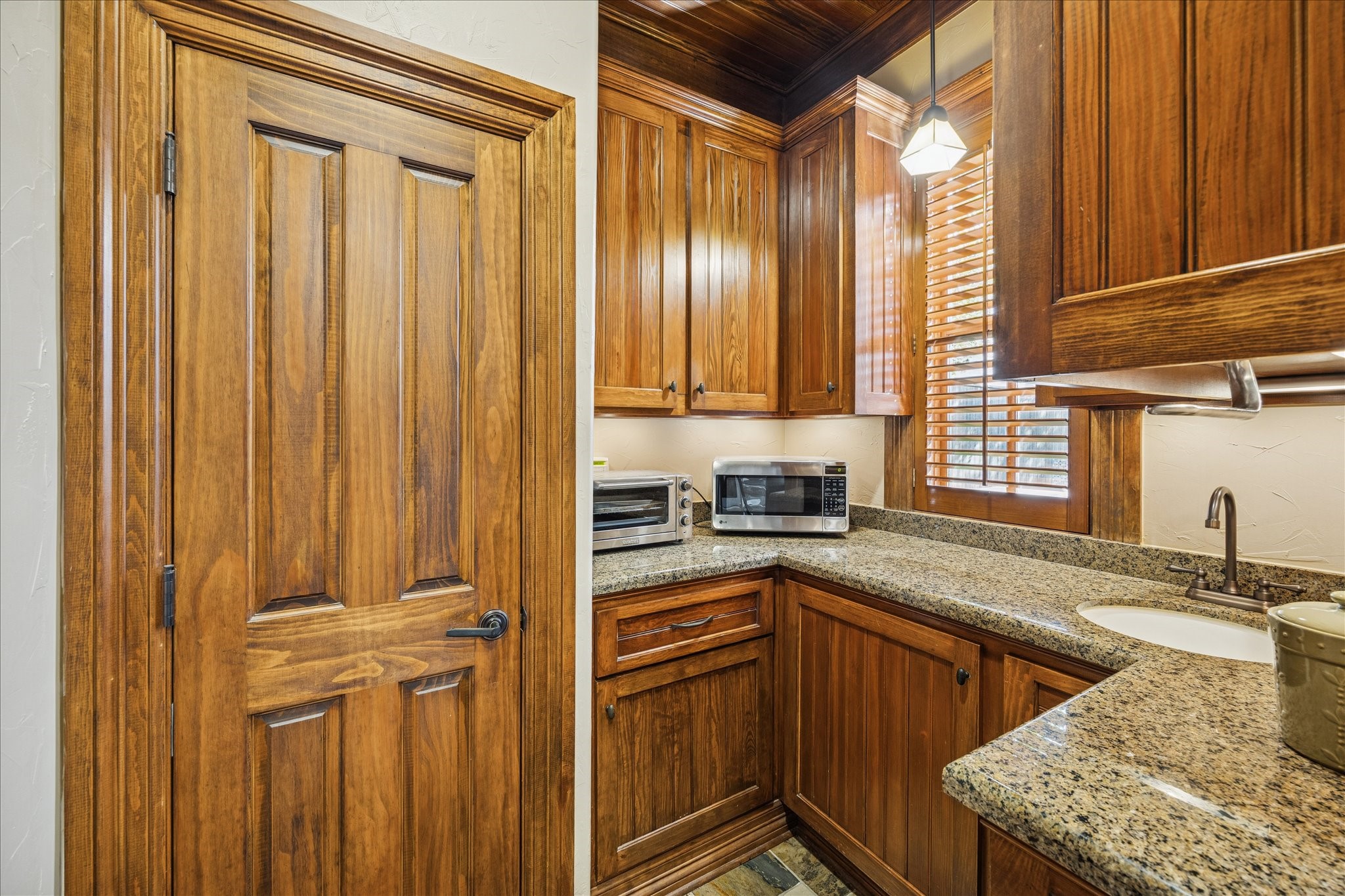 3715 Garnet Street Houston, TX 77005 - Photo 15 of 50 The well appointed butler's pantry and regular pantry is an extension of the kitchen and is ideal for meal prep, catering, and can serve as a coffee or beverage station. Ample storage makes it easy to stay organized.