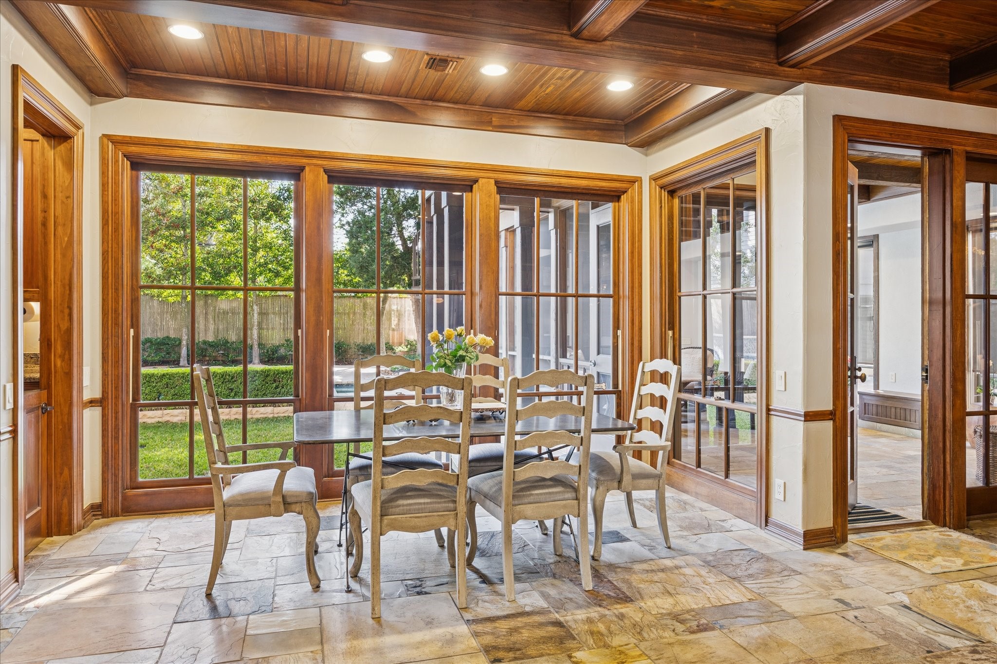 3715 Garnet Street Houston, TX 77005 - Photo 16 of 50 The comfortable breakfast area features large glass-paneled doors and windows.