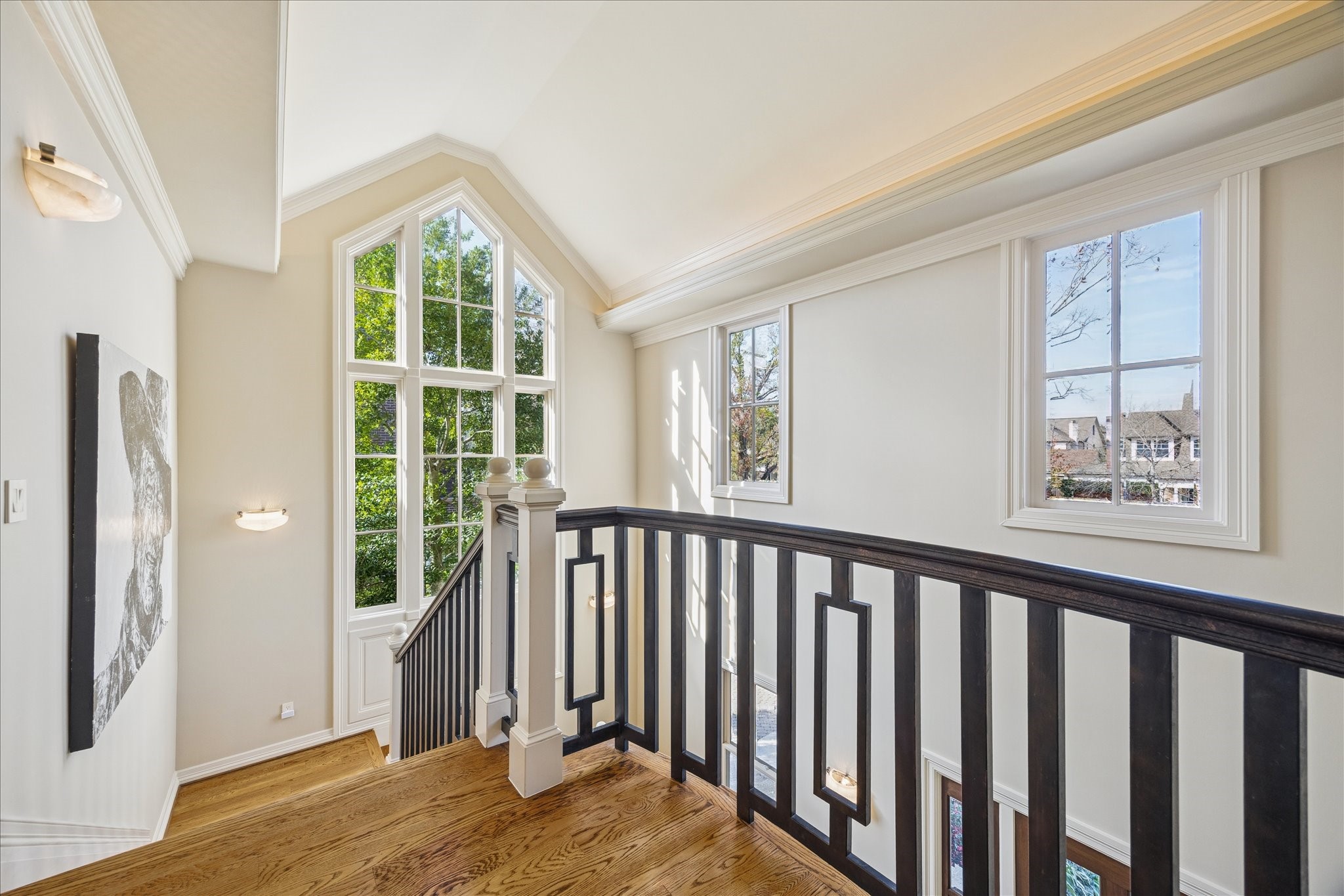 3715 Garnet Street Houston, TX 77005 - Photo 23 of 50 The landing area highlights architectural beveled windows and enhance the space with brilliant light.