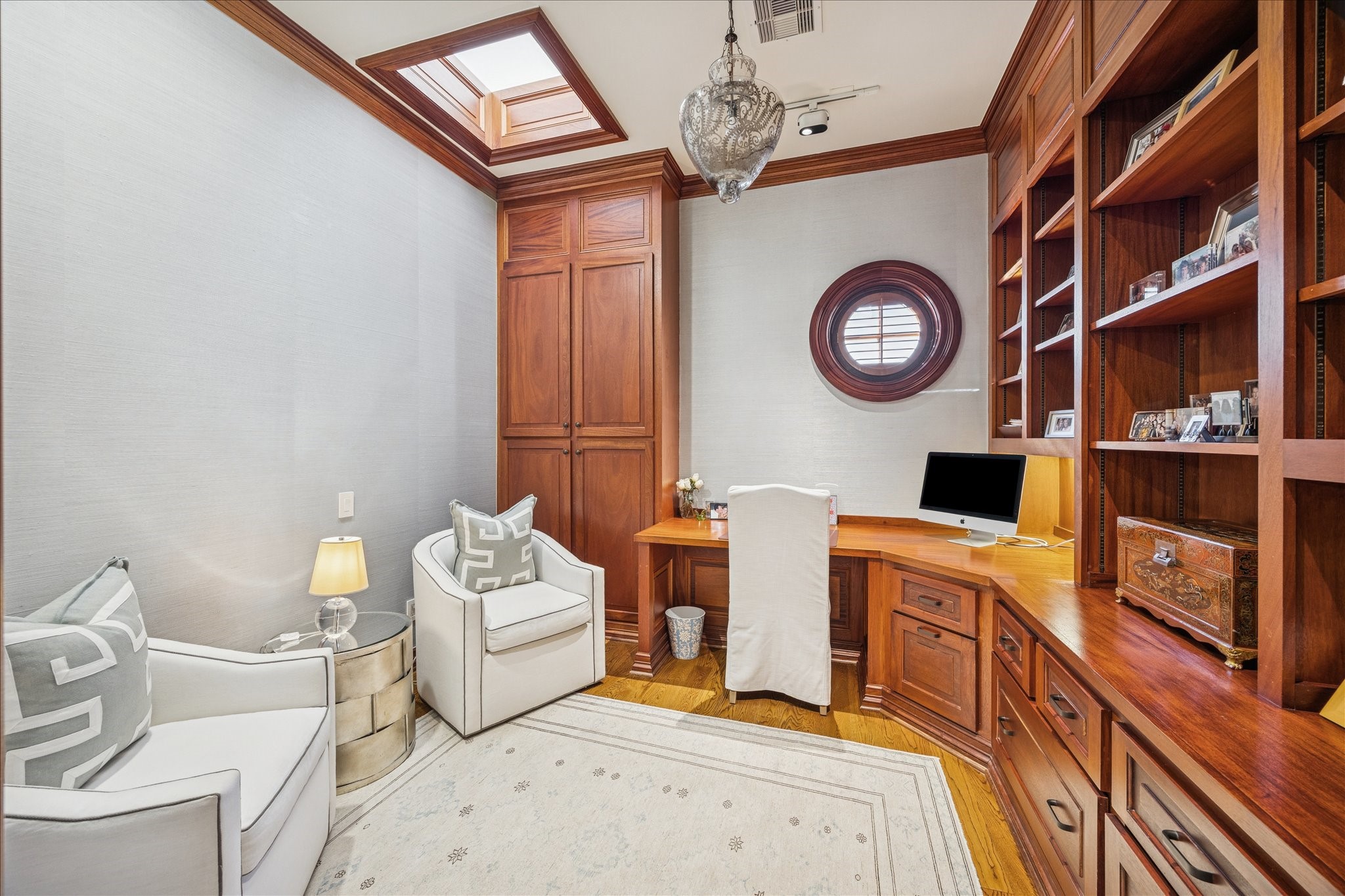 3715 Garnet Street Houston, TX 77005 - Photo 30 of 50 This upstairs study features a built- in desk space, a comfortable seating area and a skylight.