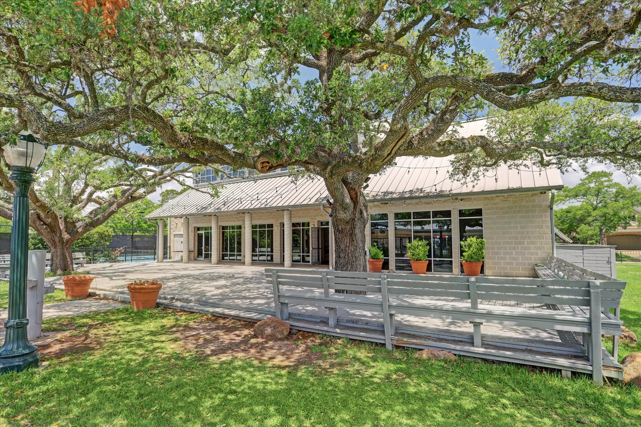 3715 Garnet Street Houston, TX 77005 - Photo 48 of 50 The Southside Place clubhouse is home to many festive events throughout the year. Two tennis courts are available for SS residents.