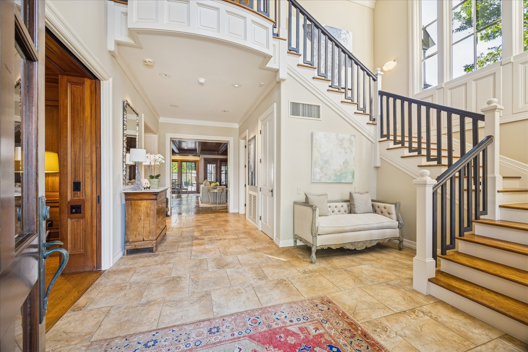 3715 Garnet Street Houston, TX 77005 - Photo 5 of 50 Striking entryway with lofty ceilings, grand staircase and beautiful beveled windows.