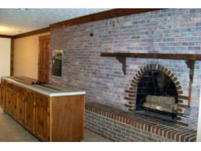 1807 Winchester Road Shady Valley, TN 37688 - Photo 7 of 24 GASWOOD FIREPLACE IN KITCHEN