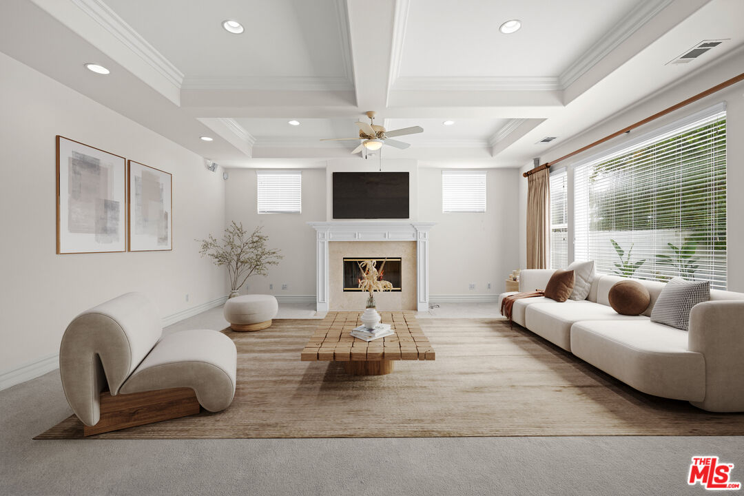 1756 Ruhland Avenue Manhattan Beach, CA 90266 - Photo 11 of 75 a living room with furniture a fireplace and a flat screen tv