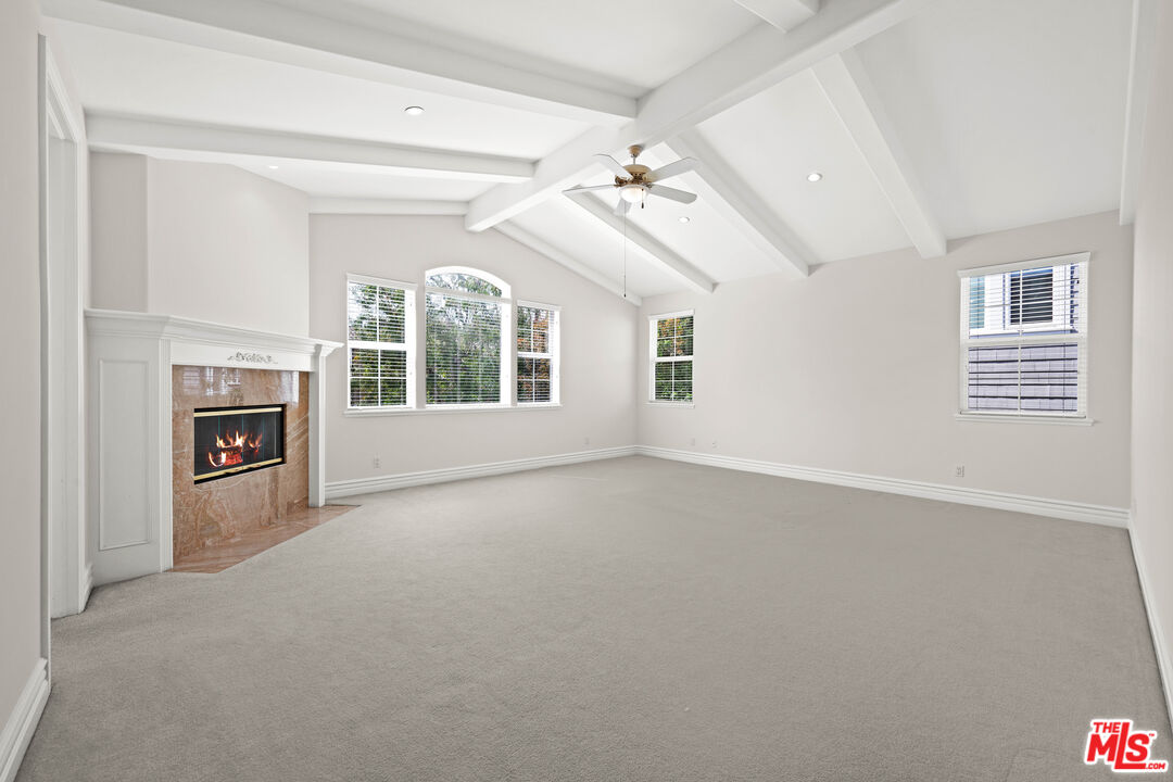 1756 Ruhland Avenue Manhattan Beach, CA 90266 - Photo 14 of 75 an empty room with windows and fireplace