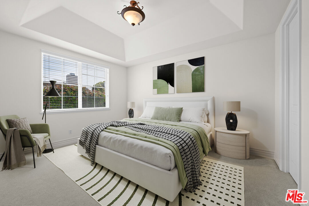 1756 Ruhland Avenue Manhattan Beach, CA 90266 - Photo 15 of 75 a bedroom with a bed and wooden floor