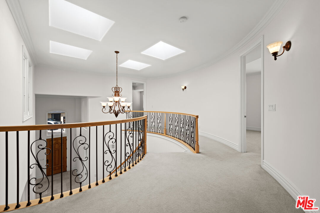 1756 Ruhland Avenue Manhattan Beach, CA 90266 - Photo 40 of 75 a view of hallway with chandelier