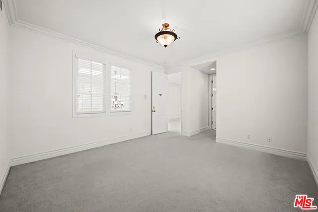 an aerial view of a house with outdoor space