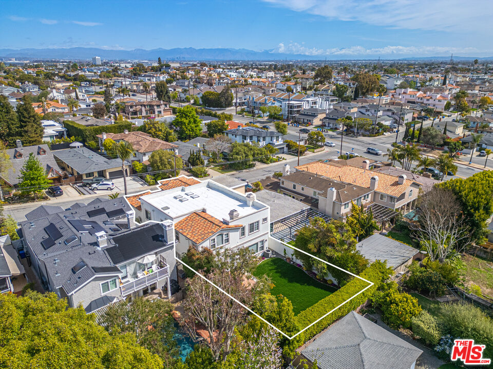 1756 Ruhland Avenue Manhattan Beach, CA 90266 - Photo 69 of 75 an aerial view of a city with lots of residential buildings and ocean view in back